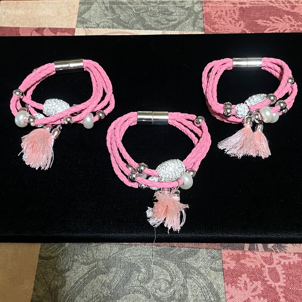 Pink Braided pug faux leather tassel bracelet with Silver Accents